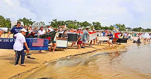 Teams getting ready to launch their cardboard boats